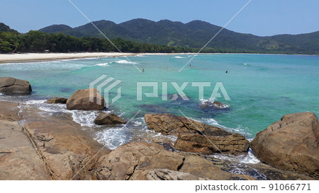 Clear and green waters on tropical beach at Ilha Grande, Rio de Janeiro, Brazil Clear and green waters on tropical beach at Ilha Grande, Rio de Janeiro, Brazil 91066771
