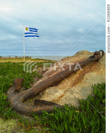 An ancient anchor exposed on the beach of Punta del Este, Uruguay An ancient anchor exposed on the beach of Punta del Este, Uruguay 91066909