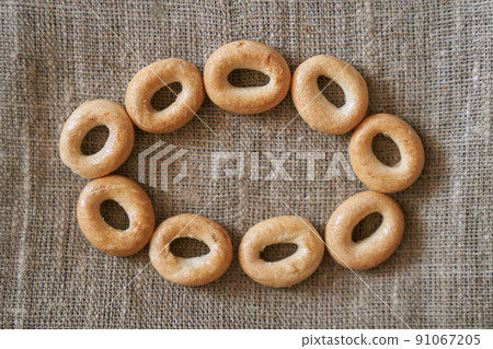 Round drying in the shape of an oval on a linen napkin. Space for copying. Top view. High quality photo 91067205