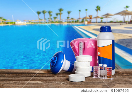 Equipment with chemical cleaning products and tools for the maintenance of the swimming pool. 91067495
