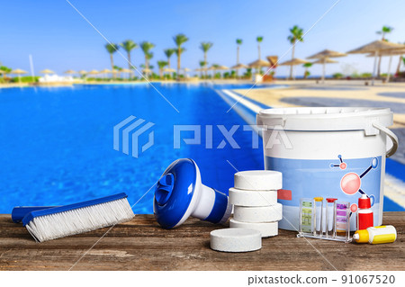 Equipment with chemical cleaning products and tools for the maintenance of the swimming pool. 91067520