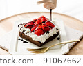 Handmade strawberry cake and chocolate sauce like those purchased at the store 91067662