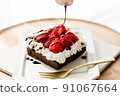 Handmade strawberry cake and chocolate sauce like those purchased at the store 91067664