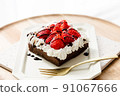 Handmade strawberry cake and chocolate sauce like those purchased at the store 91067666