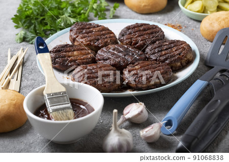 Delicious grilled cutlets and fresh buns 91068838