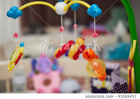 Baby mobile above the newborn crib. Baby mobile above the newborn crib. 91069451