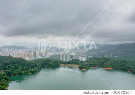 18 June 2022 the cityscape with the Upper Shing Mun Reservoir 91070164
