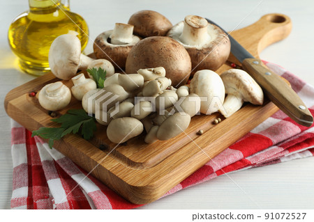 Concept of cooking with mushroom on white wooden 91072527