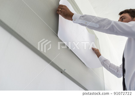 Low angle view of business leader preparing a presentation 91072722
