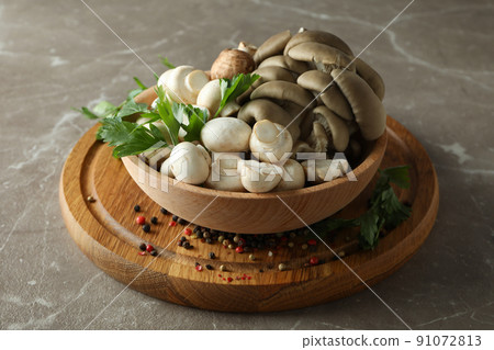 Concept of tasty food with mushrooms on gray textured background 91072813