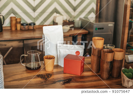 Coffee and dishes on bar counter in cafe 91075647