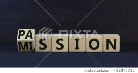 Do your mission with passion. Turned wooden cubes and changed the concept word Mission to Passion. Beautiful black background. Business motivational passion and mission concept. Copy space. 91075785