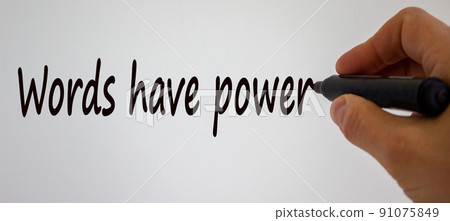 Hand writing 'words have power', isolated on beautiful white background. Concept. Hand writing 'words have power', isolated on beautiful white background. Concept. 91075849