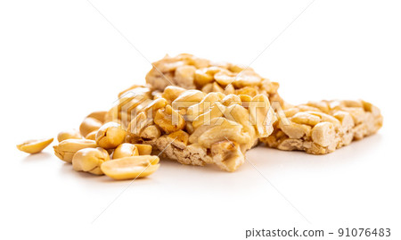 Sweet peanut bars isolated on white background. 91076483