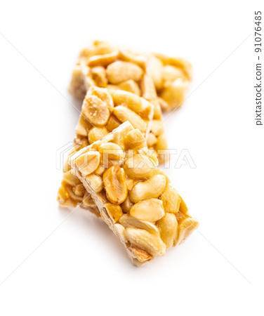 Sweet peanut bars isolated on white background. 91076485