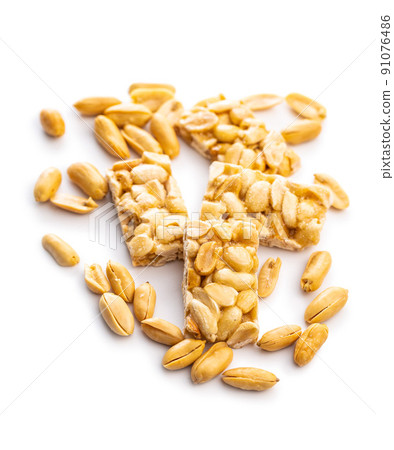 Sweet peanut bars isolated on white background. 91076486