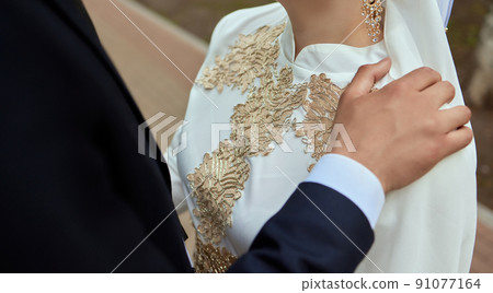 National wedding. Bride and groom. Wedding muslim couple during the marriage ceremony. Muslim marriage. National wedding. Bride and groom. Wedding muslim couple during the marriage ceremony. Muslim marriage. 91077164