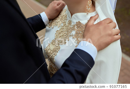 National wedding. Bride and groom. Wedding muslim couple during the marriage ceremony. Muslim marriage. National wedding. Bride and groom. Wedding muslim couple during the marriage ceremony. Muslim marriage. 91077165
