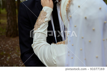 National wedding. Bride and groom. Wedding muslim couple during the marriage ceremony. Muslim marriage. National wedding. Bride and groom. Wedding muslim couple during the marriage ceremony. Muslim marriage. 91077169