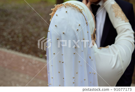 National wedding. Bride and groom. Wedding muslim couple during the marriage ceremony. Muslim marriage. National wedding. Bride and groom. Wedding muslim couple during the marriage ceremony. Muslim marriage. 91077173