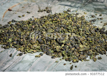 Pu-erh fermented Chinese tea in a roll. 91077512