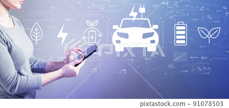 EV concept with woman using a tablet 91078503