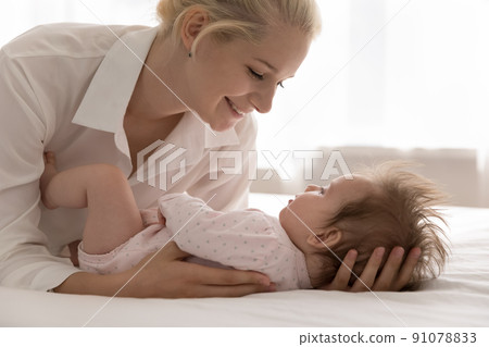 Close up shot loving mother touch her lovely newborn baby 91078833