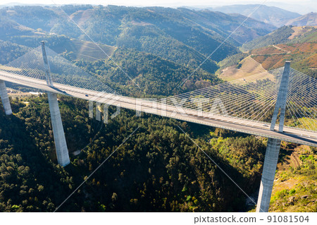 Drone view of Vila Real suspension viaduct crossing Corgo River gorge 91081504