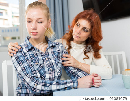 Mature mom apologizes to daughter after quarrel Mature mom apologizes to daughter after quarrel 91081679