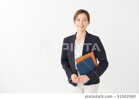 Woman in suit white background 91082060