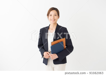 Woman in suit white background Woman in suit white background 91082063