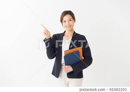 Woman in suit white background 91082201