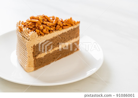 coffee almonds cake on plate 91086001