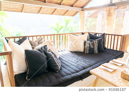 pillow on sofa on balcony pillow on sofa on balcony 91086187