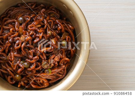 Korean black spaghetti or instant noodle with roasted chajung sauce Korean black spaghetti or instant noodle with roasted chajung sauce 91086458