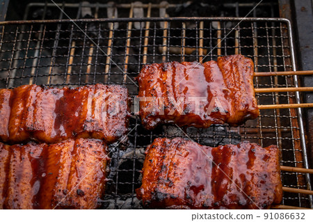 Eel grilled with a net eel Eel grilled with a net eel 91086632