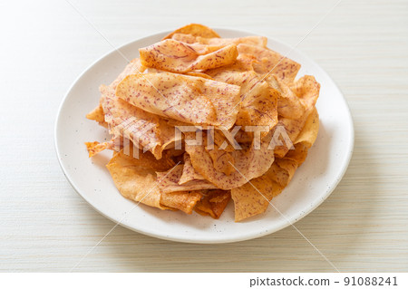 Taro Chips - fried or baked sliced taro 91088241