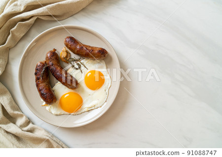 double fried egg with pork sausage double fried egg with pork sausage 91088747