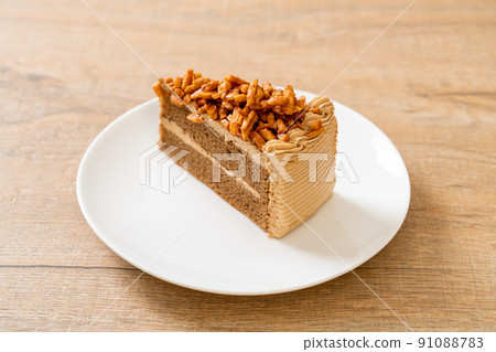 coffee almonds cake on plate 91088783