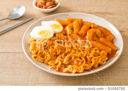 Rabokki (Ramen or Korean instant noodle and Tteokbokki) in spicy korean sauce Rabokki (Ramen or Korean instant noodle and Tteokbokki) in spicy korean sauce 91088788