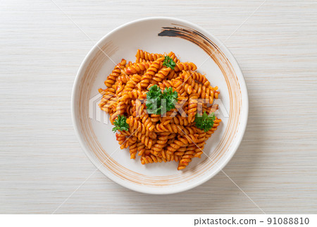 spirali or spiral pasta with tomato sauce spirali or spiral pasta with tomato sauce 91088810