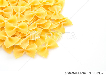 Dry uncooked farfalle pasta on white background 91088937