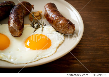double fried egg with pork sausage double fried egg with pork sausage 91089495