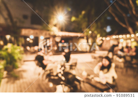 abstract blur outdoor hangout courtyard in cafe restaurant at nigh abstract blur outdoor hangout courtyard in cafe restaurant at nigh 91089531