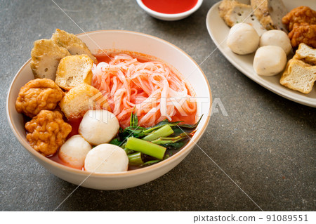 small flat rice noodles with fish balls and shrimp balls in pink soup, Yen Ta Four or Yen Ta Fo small flat rice noodles with fish balls and shrimp balls in pink soup, Yen Ta Four or Yen Ta Fo 91089551