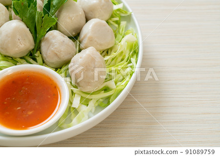 Boiled Fish Balls with Spicy Sauce 91089759