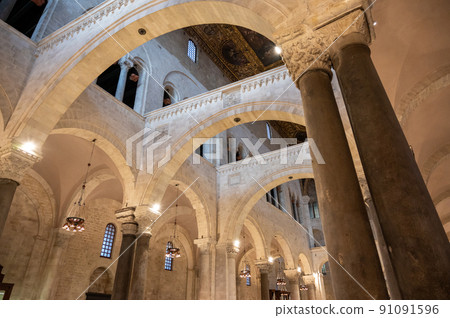 Bari, Puglia, Italy. August 2021. Beautiful view inside the basilica of San Nicola, in Bari Vecchia, is the best example of Apulian Romanesque. Bari, Puglia, Italy. August 2021. Beautiful view inside the basilica of San Nicola, in Bari Vecchia, is the best example of Apulian Romanesque. 91091596