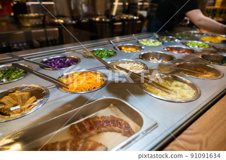 Food buffet in a restaurant close up Food buffet in a restaurant close up 91091634