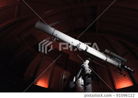Professional telescope is in an observatory 91096122