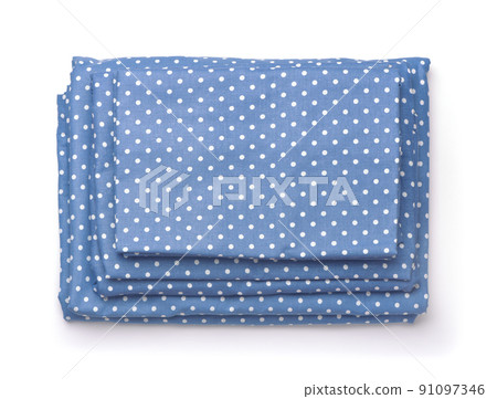 Top view of folded blue cotton bedding set 91097346
